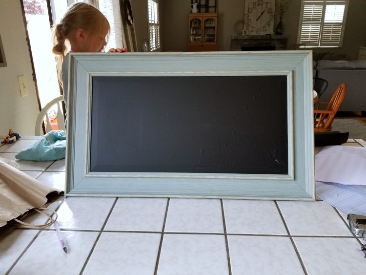 Start diy chalkboard sign by adding peel and stick chalkboard to your glass or wood frame. See finished diy and tips for chalkboard art for at DearCreatives.com