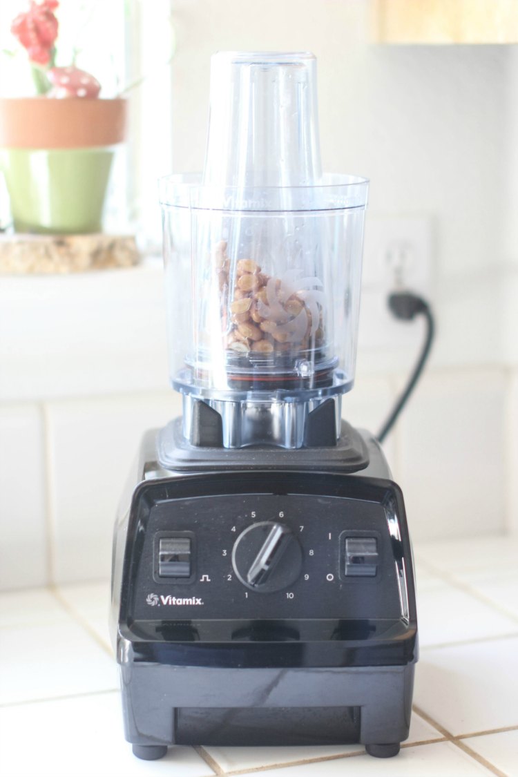 Vitamix Blender with Personal Cup Adapter on it ready to blend nuts. DearCreatives.com