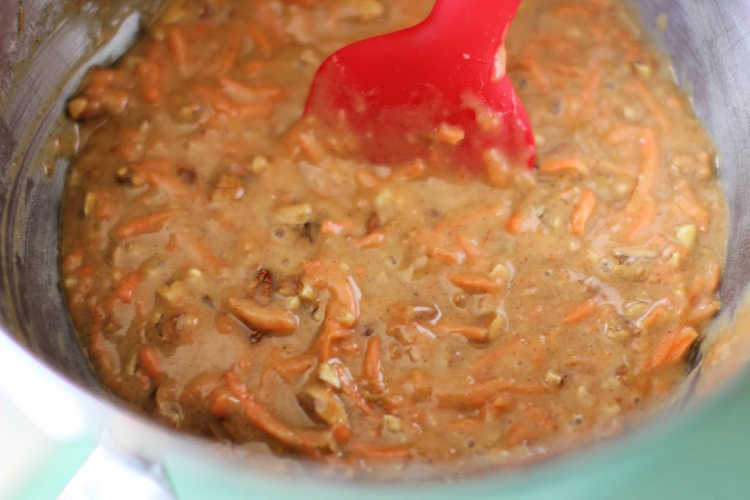 Carrot cupcakes in a mixing bowl. Ready to be scooped into a cupcake pan. DearCreatives.com