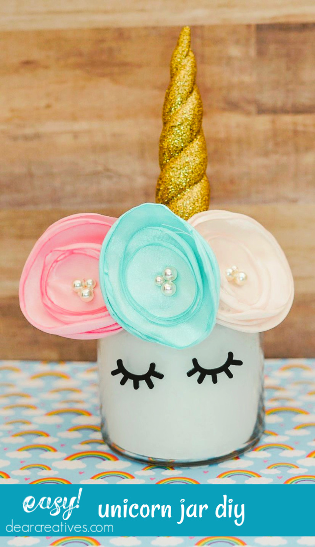 Unicorn Jar Topper - This unicorn jar diy is easy to make for your parties or for unicorn centerpieces. Find this diy so many more unicorn diys at DearCreatives.com #unicornjardiy #unicornjartoppers #unicornjars #unicorndiycenterpieces #dearcreatives