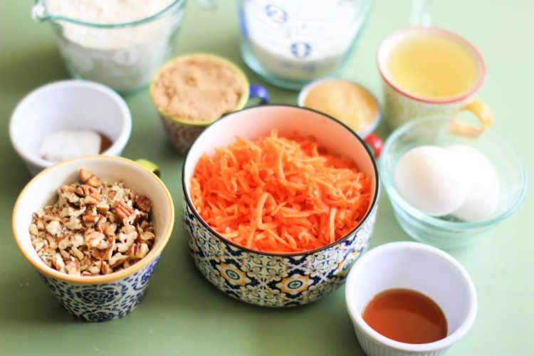 carrot cake cupcakes ingredients on a table ready to be made. cupcake recipes including this carrot cake cupcakes recipe at DearCreatives.com