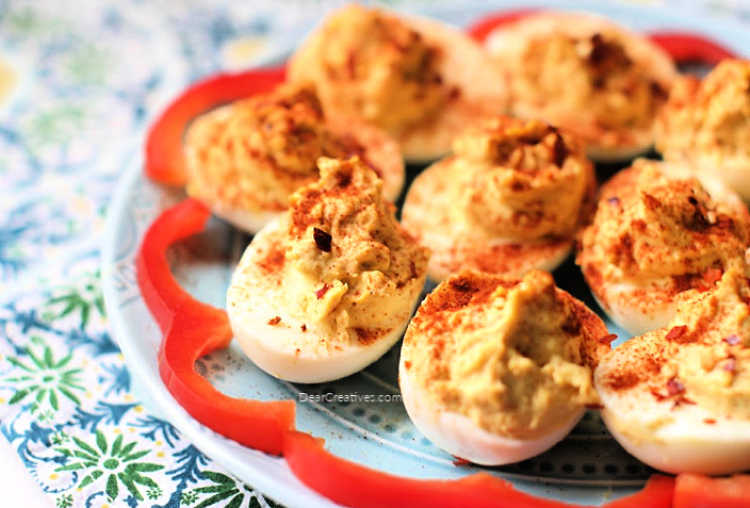 deviled eggs sprinkled with paprika on top © 2019 DearCreatives.com