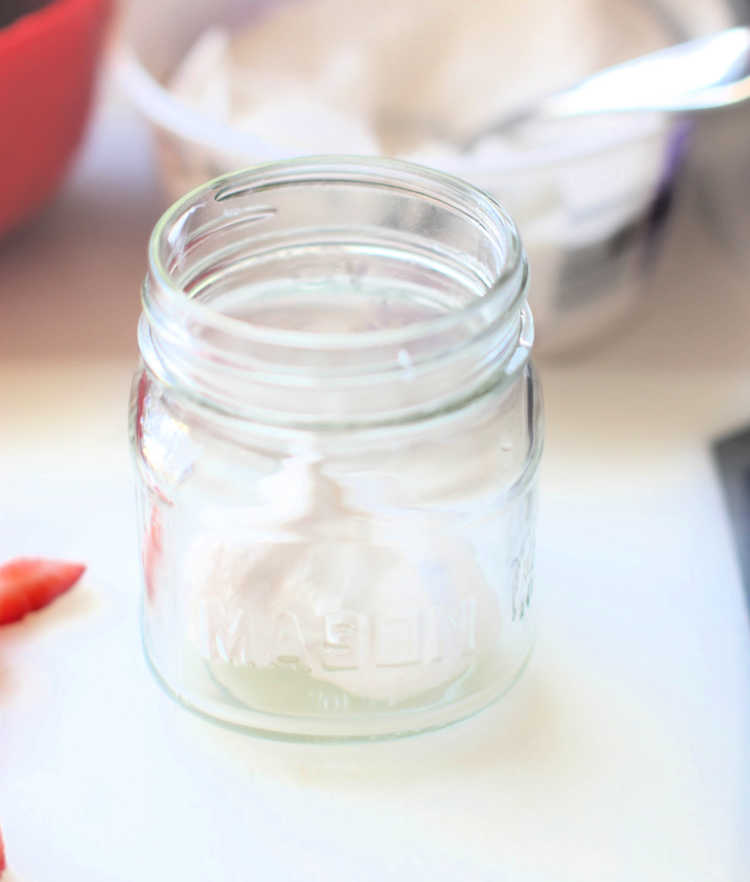 whip cream and a mason jar read to assemble a no bake Patriotic dessert DearCreatives.com