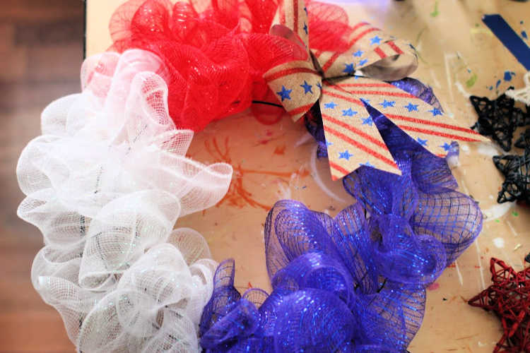 Adding red, white and blue stars to the Patriotic wreath. How -to at © 2019 DearCreatives.com