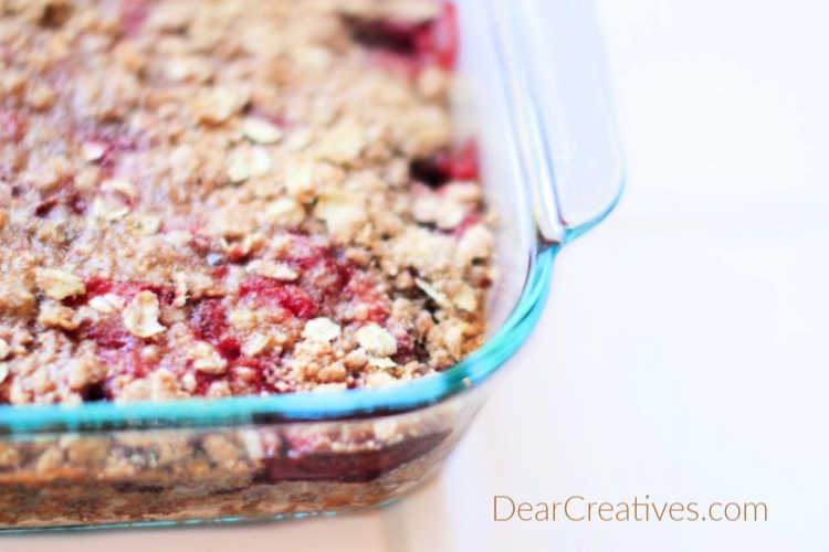 Freshly baked, just out of the oven a strawberry dessert recipe for Strawberry Oatmeal Bars - DearCreatives.com