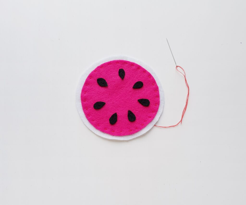 step (3) how to make felt fruit coasters assembling the layers and hand sewing...