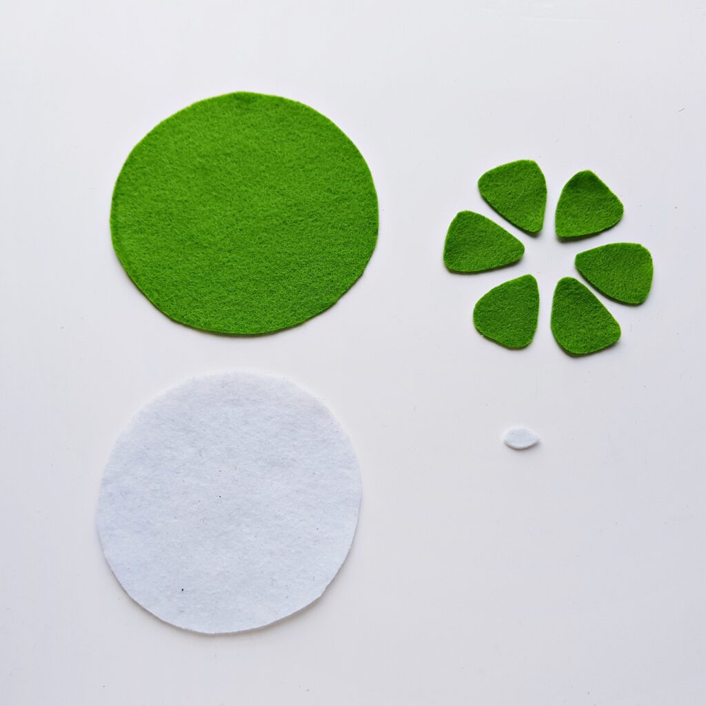 step (5) how to make felt fruit coasters repeating the process with different colored felt for other fruits this one is for sliced lime coasters.