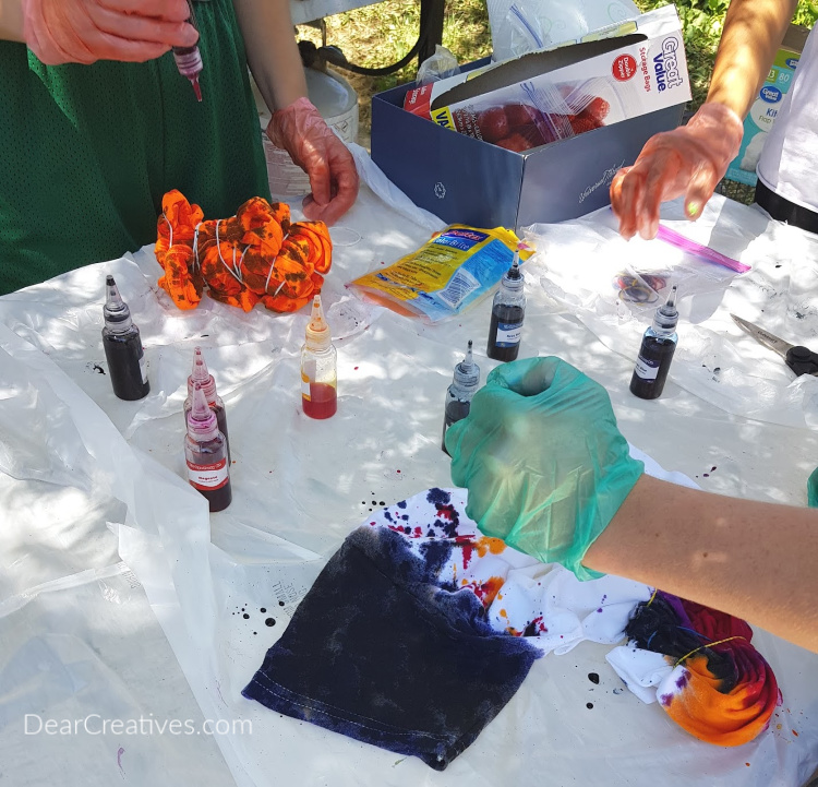 Close up of tie dying t-shirts. See how to and tie dye party at DearCreatives.com