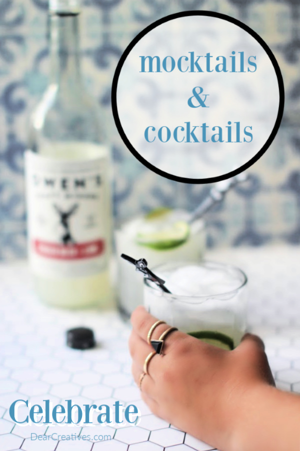 hand reaching for a drink in a glass garnished with lime - mixer for mocktails and cocktails - DearCreatives.com