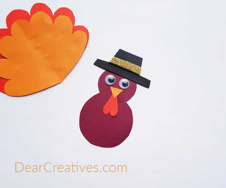 step (3) for a cardboard tube turkey craft - template and tutorial at DearCreatives.com