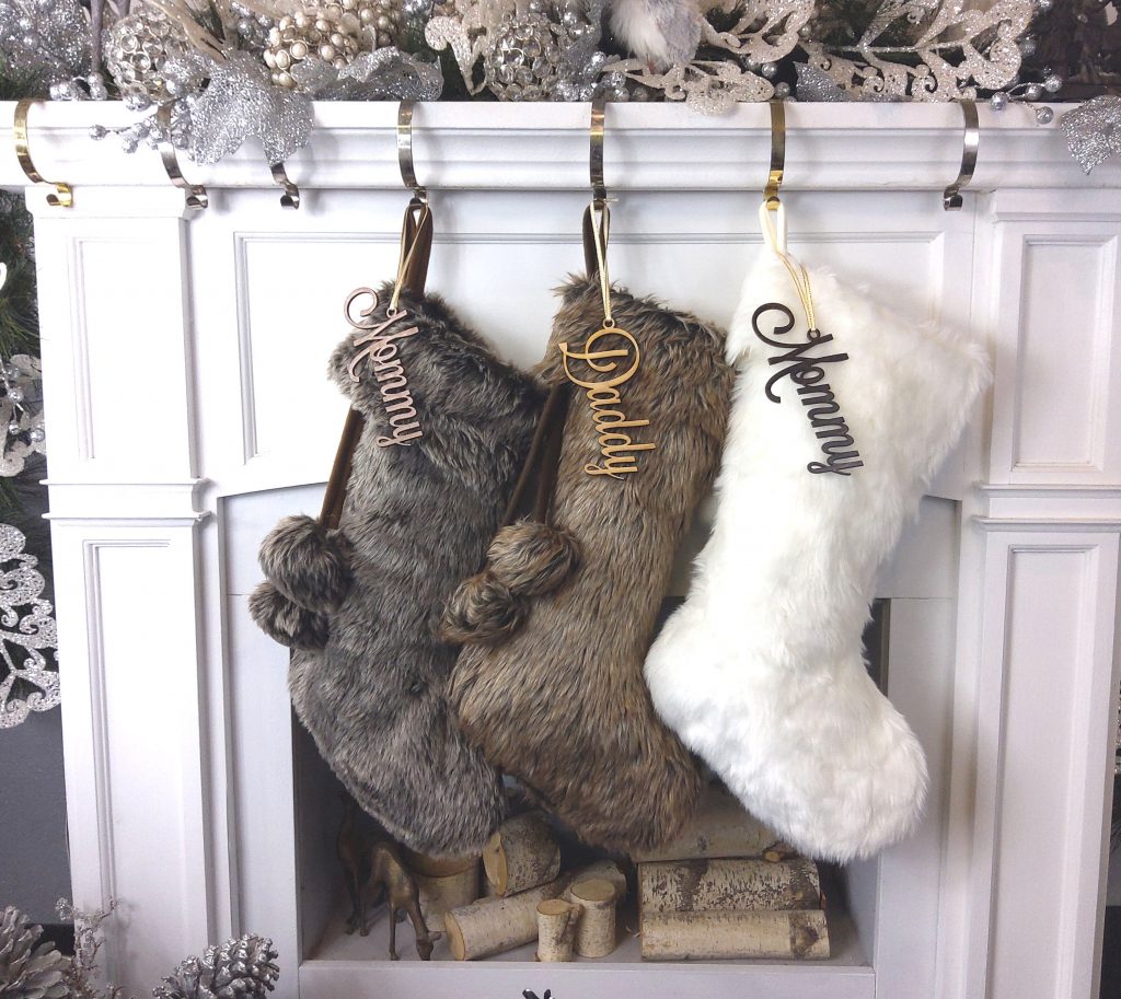 faux fur Christmas stockings with personalized wood cut out names