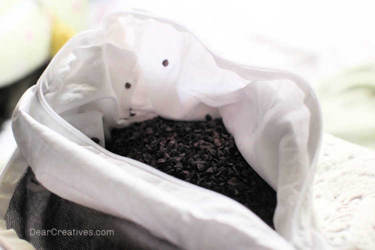 Inside look at a buckwheat hulls pillow. What are buckwheat hulls_ What is a buckwheat hull pillow_ © DearCreatives.com