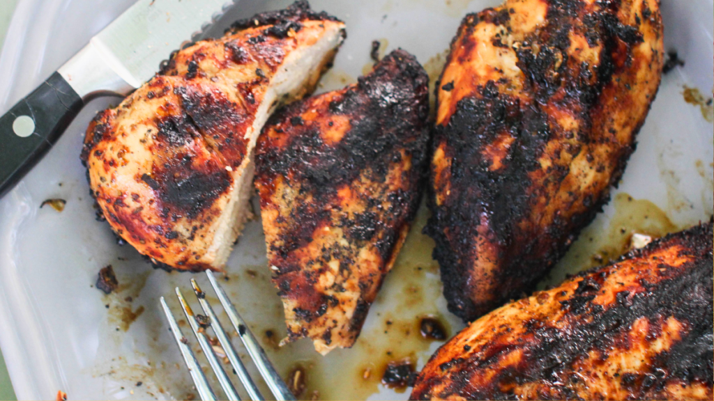 Juicy grilled chicken marinated and cooked on the grill with golden grill marks for an easy chicken marinade recipe