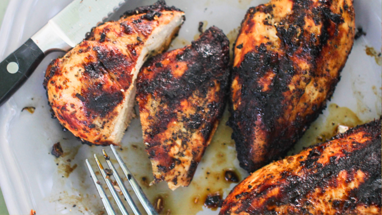 Juicy grilled chicken marinated and cooked on the grill with golden grill marks for an easy chicken marinade recipe