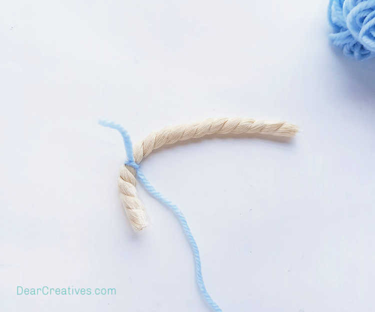 step (2) Tying yarn onto the rope - DIY rope rainbow at DearCreatives.com