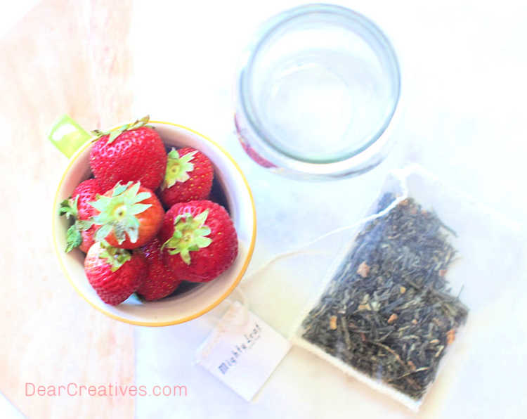 strawberry iced tea - ingredients for making an iced strawberry drink with tea - get the drink recipe at © DearCreatives.com