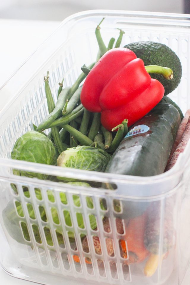 Produce being stored in a produce storage container -this container has a lid - find out more © DearCreatives.com
