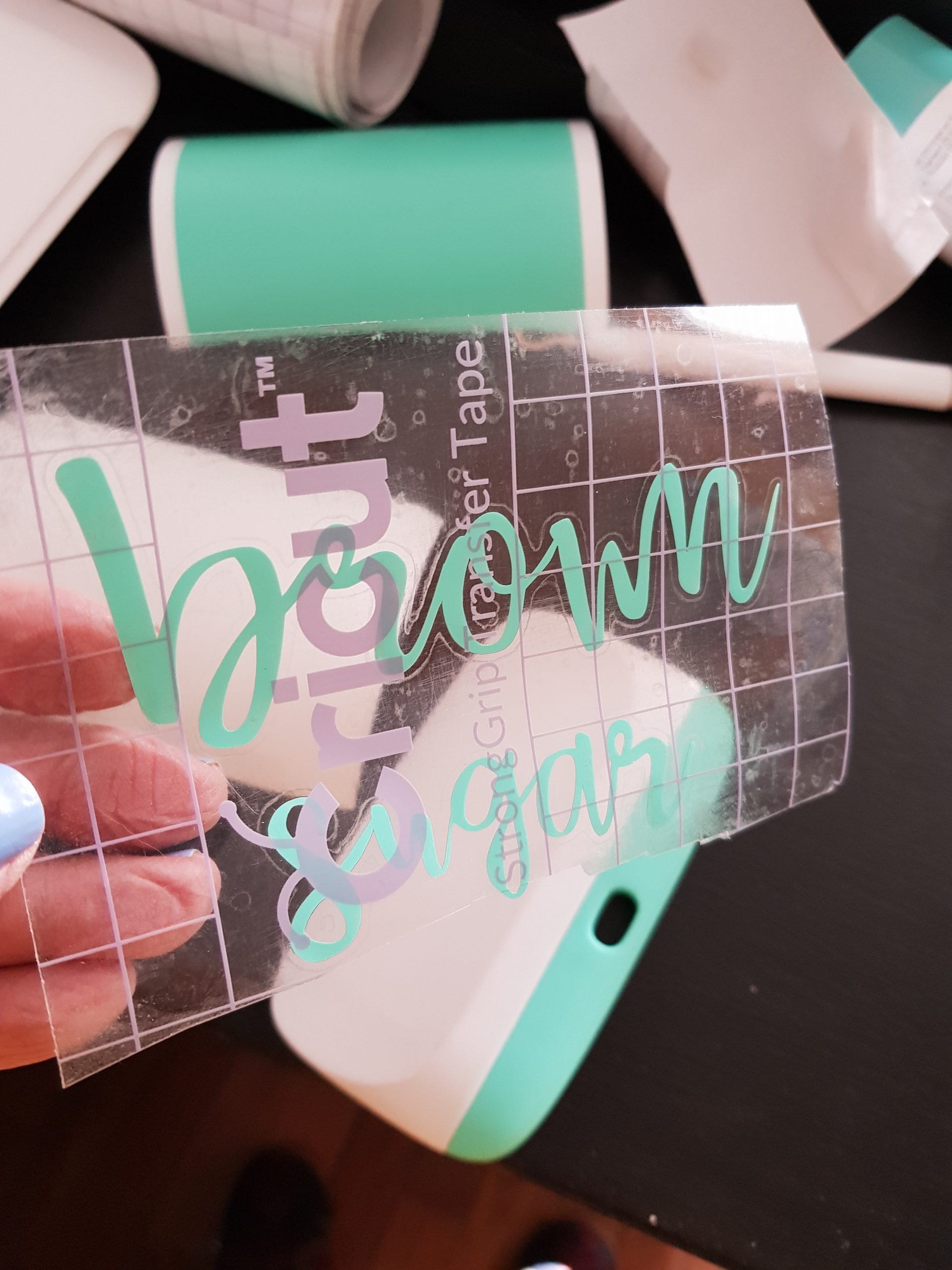 cricut transfer tape with the vinyl pantry label on it - DIY at DearCreatives.com