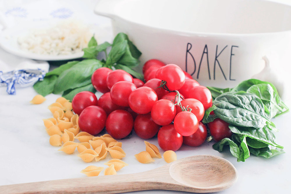 Ingredients- pasta noodles, basil, feta cheese crumbles, garlic, tomatoes - click to print recipe © DearCreatives.com