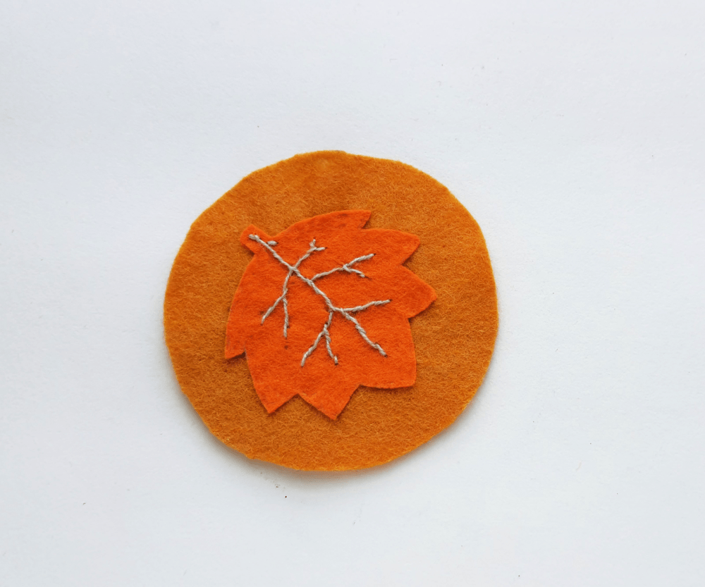 Maple Leaf Felt Coaster Steps (5).j Fill the vein lines with solid stitches... Felt Crafts and instructions for the coasters to make are at DearCreatives.com.