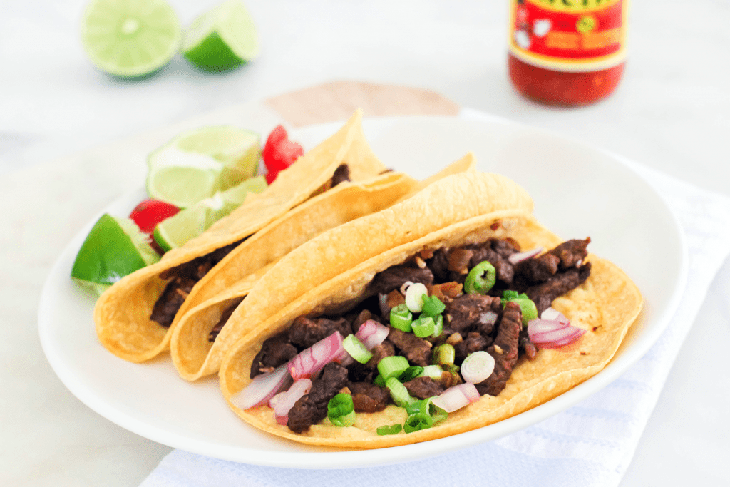 Steak Tacos - These are just like Mexican street tacos. Delicious, easy to make. See how to cook steak tacos and grab the recipe at © DearCreatives.com