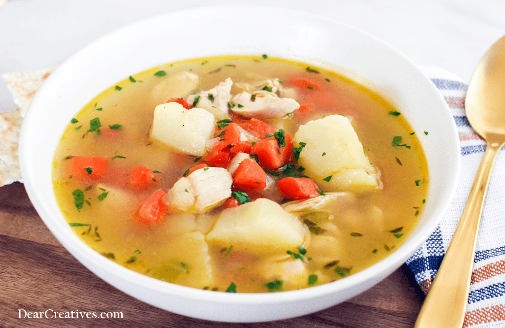 Close-up of a bowl of soup. Grab the recipe at DearCreatives.com