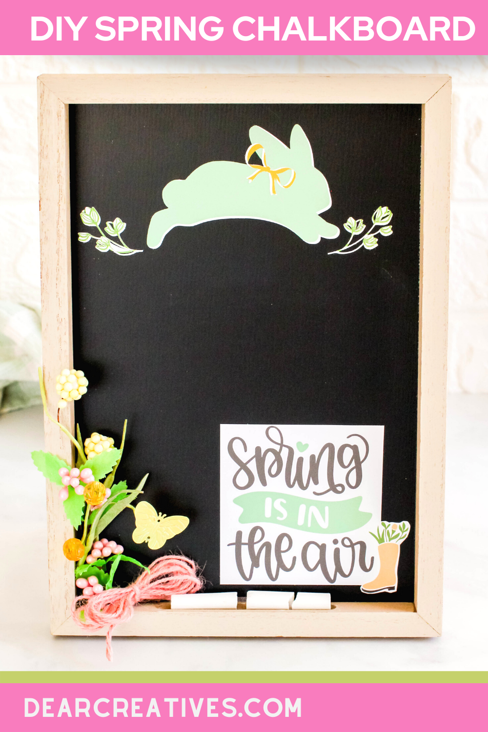 DIY Spring Chalkboard - This is an easy chalkboard art idea. Using stickers made with a Cricut (or purchased), artificial flowers, and a chalkboard. See how to decorate a chalkboard for spring! Find this and other DIY home decor ideas at DearCreatives.com