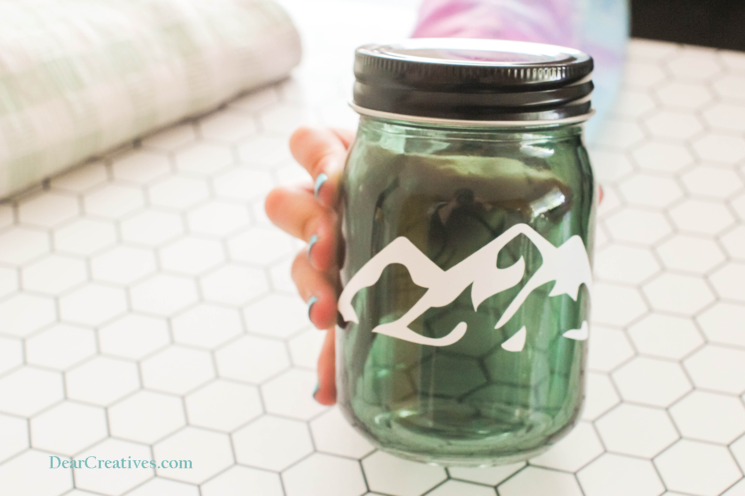 Cricut Crafts beginner project - How to add vinyl designs to jars. Cricut jar with mountain design... © DearCreatives.com
