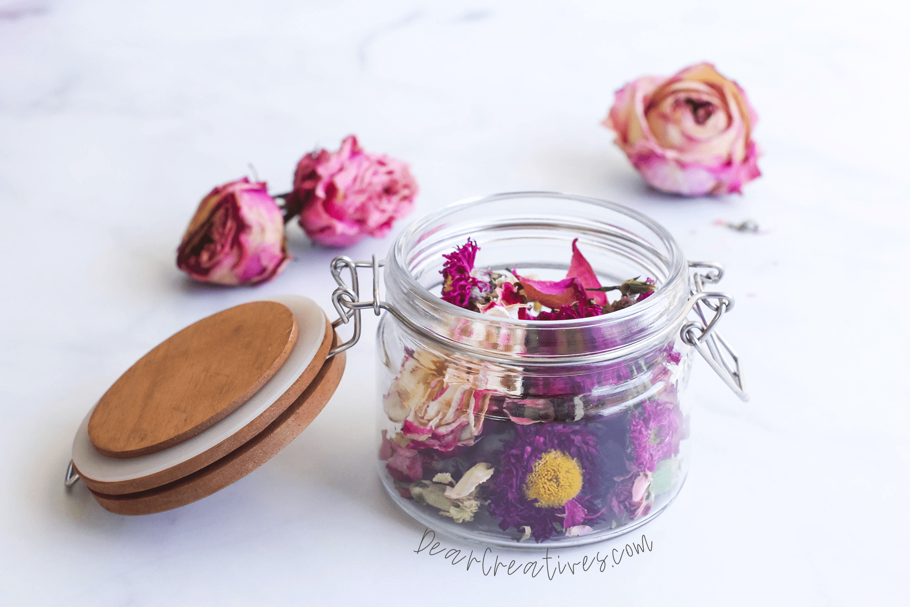 Dried flowers arranged in a jar for potpourri. How to make potpourri instructions at DearCreatives.com ©2022 DearCreatives.com