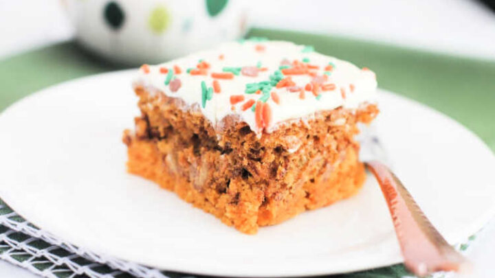 Pumpkin Dump Cake - The best fall cake that is so easy to make and a crowd-pleasing cake. Make it in a 13 x 9 size baking pan. Using a cake mix and pantry ingredients make this delicious pumpkin dump cake topped with frosting and sprinkles... DearCreatives.com