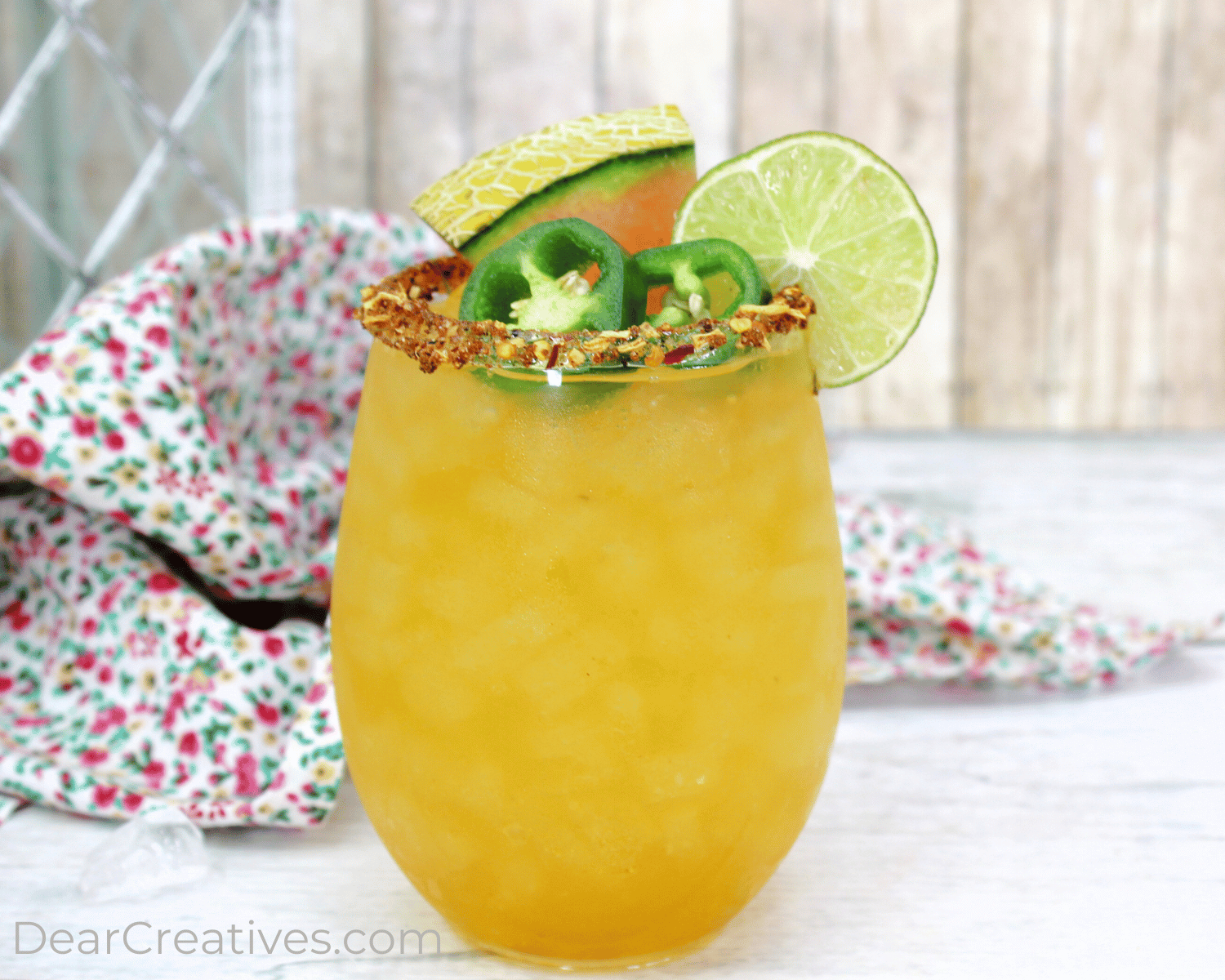 Cantaloupe Jalapeno Margaritas Recipe - An easy way to spice up your summer sipping and cantaloupe margaritas! Print the margarita cocktail recipe at DearCreatives.com