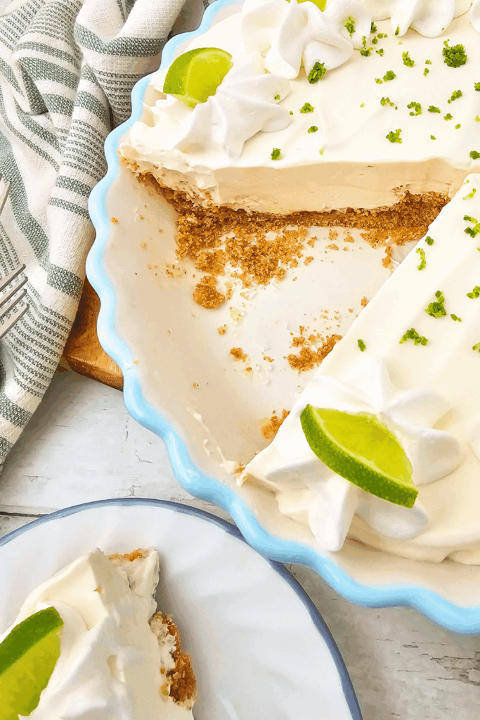 Key Lime Pie - This is a no bake recipe.  Creamy, key lime pie with a graham cracker crust. Easy to make, quick to prep, then chill several hours and serve the pie in big or small slices! DearCreatives.com