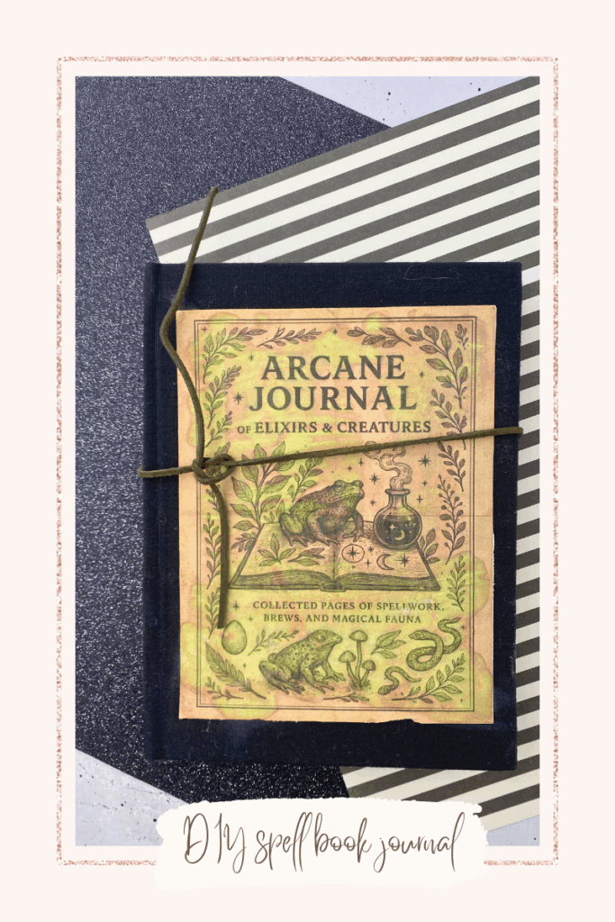 image of a black journal with printable grimoire graphic frog, spell book, grimoire journal, witchy graphics, potions bottle, mushrooms, snakes, do it your self spell book journal