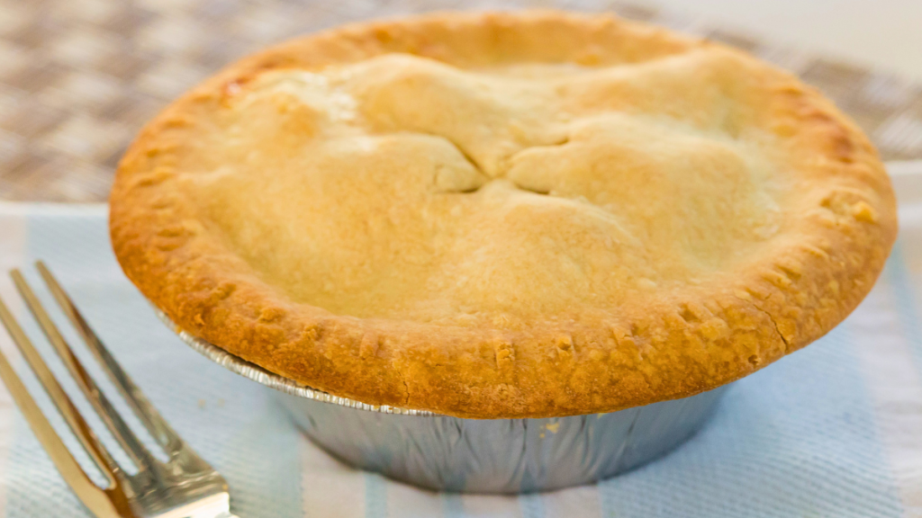 Beef pot pie with a flaky golden crust baked until golden brown and ready to serve