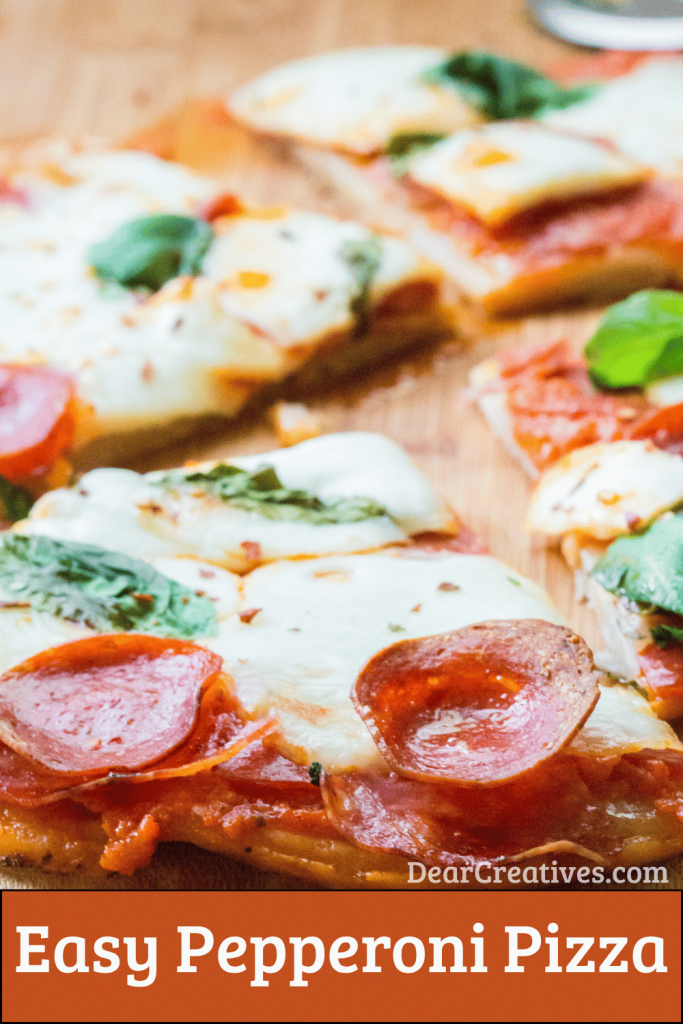 Pepperoni pizza on a cutting board ready to be served
